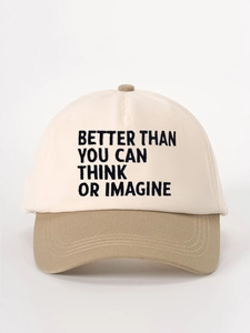 Detail of embroidered text Better Than You Can Think on a two-tone baseball cap