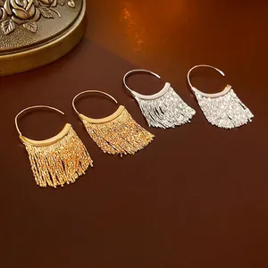 Minimalist C-shape fringe drop earrings in gold and silver finish with metal chain tassels