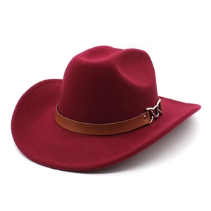 Detail of burgundy wool felt western hat featuring brown leather band and silver chain