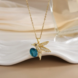 Golden titanium steel hummingbird necklace with blue gemstone and zircon bird pendant