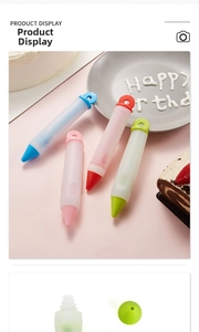 Detailed view of four silicone decorating pens for cake writing and cookie decoration