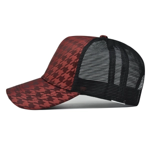 Classic red and black houndstooth trucker hat with breathable mesh back on white background