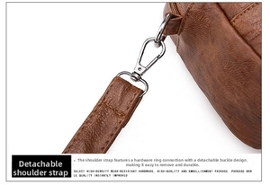 Vue détaillée de la bandoulière amovible avec crochets en métal argenté sur un sac marron