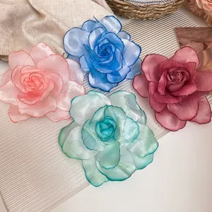Elegant 3D organza rose hair clips in pink, blue, and burgundy for casual resort wear