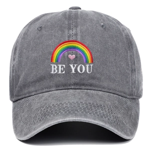 Washed grey cotton baseball cap featuring rainbow embroidery and 'BE YOU' text