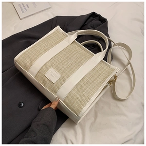 Summer woven straw tote bag with beige PU leather trim and long shoulder strap