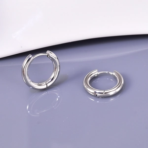 Polished silver titanium steel hoop earrings with classic clasp design and mirror finish