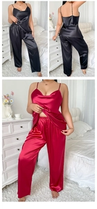 Detail of two-piece satin pajama set with camisole and long pants in black and burgundy