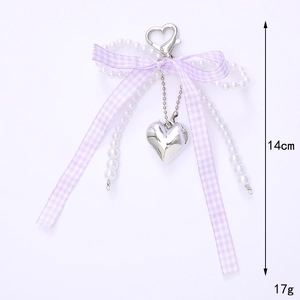 Elegant purple checkered bow pearl keychain with silver heart pendant for bags, 14cm length