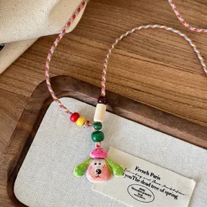Colorful woven wax rope necklace with cute ceramic dog pendant and wooden beads