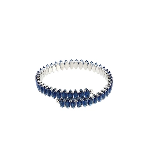 Detail of luxury necklace with marquise cut deep blue crystals in silver claw settings