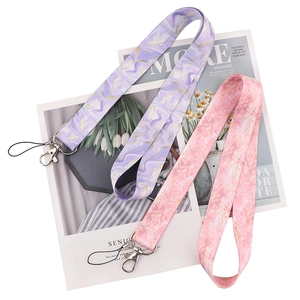 Pink and purple marble textured phone lanyards with gold veins and metal clips
