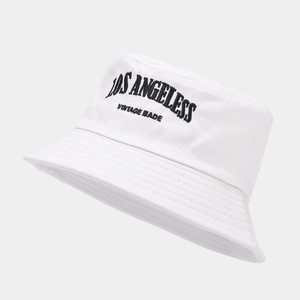 Close-up of Los Angeles vintage embroidery on white cotton twill bucket hat side view