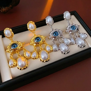 Vintage style evil eye pearl drop earrings in gold and silver finish for women