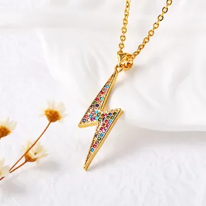 Close-up of gold lightning bolt pendant with colorful crystals and 45cm chain