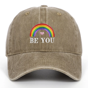 Close-up of rainbow and Be You embroidery on vintage washed cotton baseball cap