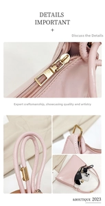 Detail view of pink patent leather bag showing golden metal zipper and spacious interior