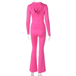 Rear view of rose pink hooded tracksuit set featuring zip-up top and flared sports pants