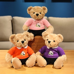 Three plush teddy bears in pink, orange, and purple outfits with cute panda embroidery