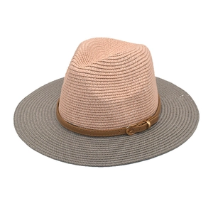 Top view of two-tone straw fedora with pink crown, grey brim and leather band
