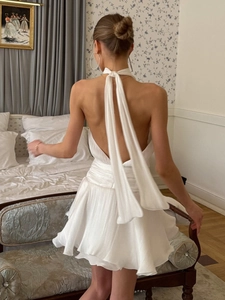 Elegant white halter backless satin dress with long ribbon tie and pleated A-line skirt