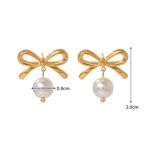 Elegant 18k gold stainless steel bow earrings with 8mm white pearls on white background