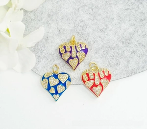 Detail of 18K gold plated heart charms with colorful enamel and pavé zircon stones