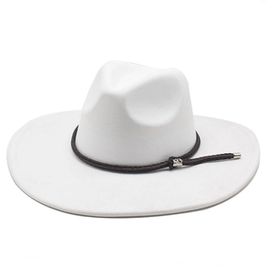 Detailed macro view of white suede fedora featuring a woven brown cord and silver buckle