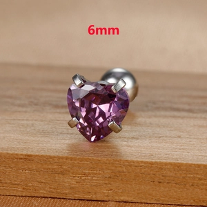 Macro shot of 6mm purple heart-shaped cubic zirconia stud with silver titanium base