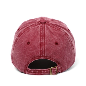 Detail of red vintage baseball cap showing the adjustable metal buckle and back opening
