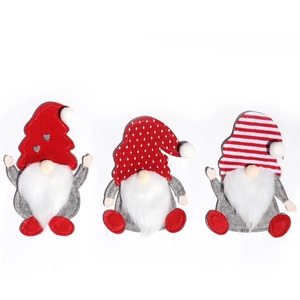 Three Christmas gnome cutlery bags in red and grey with heart and stripe patterns