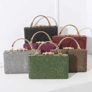 Luxe evening clutch with rhinestones and bamboo-style gold handle in multiple colors