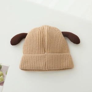 Close-up of baby knit beanie featuring cute 3D dog ears and warm ribbed texture