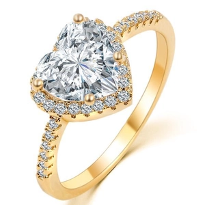 Golden orbital ring featuring a large heart-shaped crystal with halo diamond accents