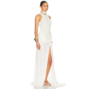 Sleeveless white high-neck maxi dress with sexy high slit and elegant draped fabric