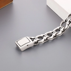 Close-up of vintage punk style heavy chain bracelet with antique silver finish and box clasp