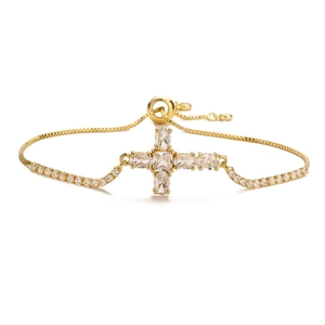 Minimalist gold cross bracelet with sparkling zircons and adjustable pull chain