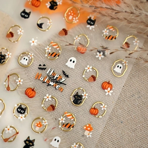 3D Halloween nail stickers with gold outlines, pumpkins, black cats and ghosts designs