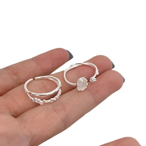 Minimalist silver oval resin ring set with bead detail and open adjustable band