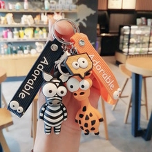 Dettaglio dei portachiavi a zebra e giraffa con cinturini stampati Adorable