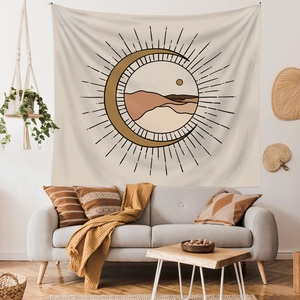 Bohemian tapestry with crescent moon and desert mountains in earthy color tones