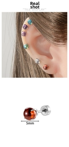 Detailed view of 5mm colorful ball stud earrings set in titanium steel for cartilage