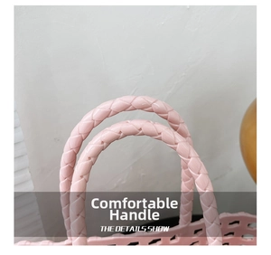 Detailed macro view of woven jelly bag with thick pink braided handles for durability