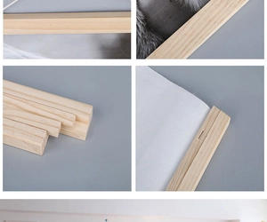 Detail view of the natural wood scroll frame texture and connection to white fabric