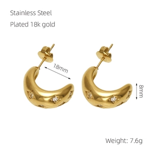 Detail view of 18k gold plated C-shaped stainless steel earrings with size dimensions
