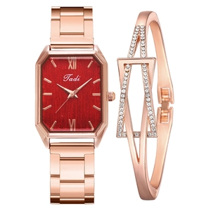 Detail of rose gold square watch with red dial and matching rhinestone bracelet set