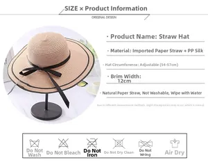 Detail of beige straw beach hat with black bow, showing 12cm brim and foldable paper texture