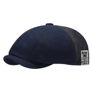 Navy blue breathable mesh newsboy cap with cotton patchwork and side woven label
