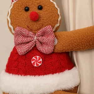 Fermatenda natalizio omino di pan di zenzero con maglione rosso e morbido peluche