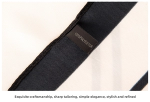 Detailed close-up of premium polyester scarf stitching with black border and care label